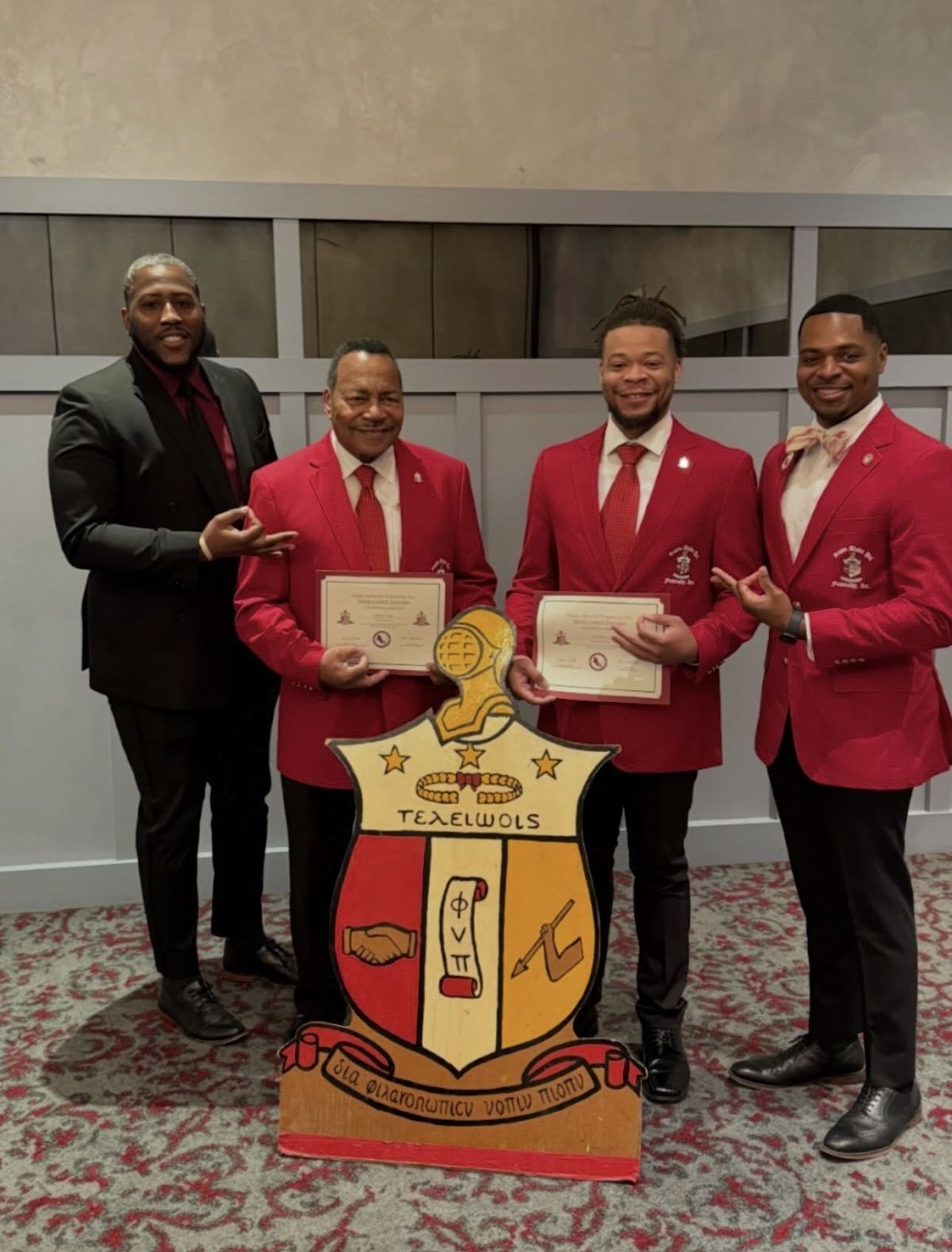 Polemarch George Akpan and MTA Chairman Oronde Fleming with Spring 2026 initiates Brother Spencer Coggs and Brother Aaron Boston