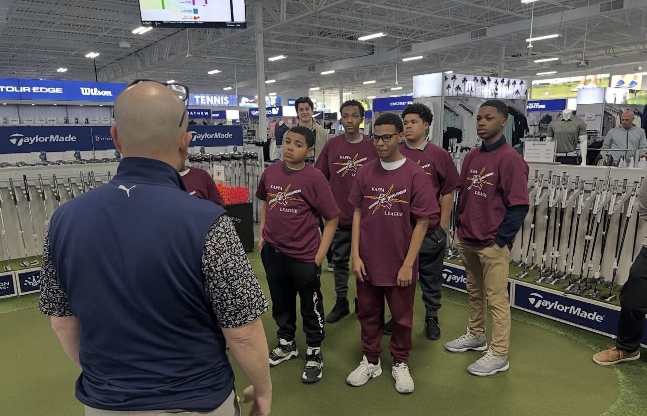 Kappa League young men on a field trip to a golf store