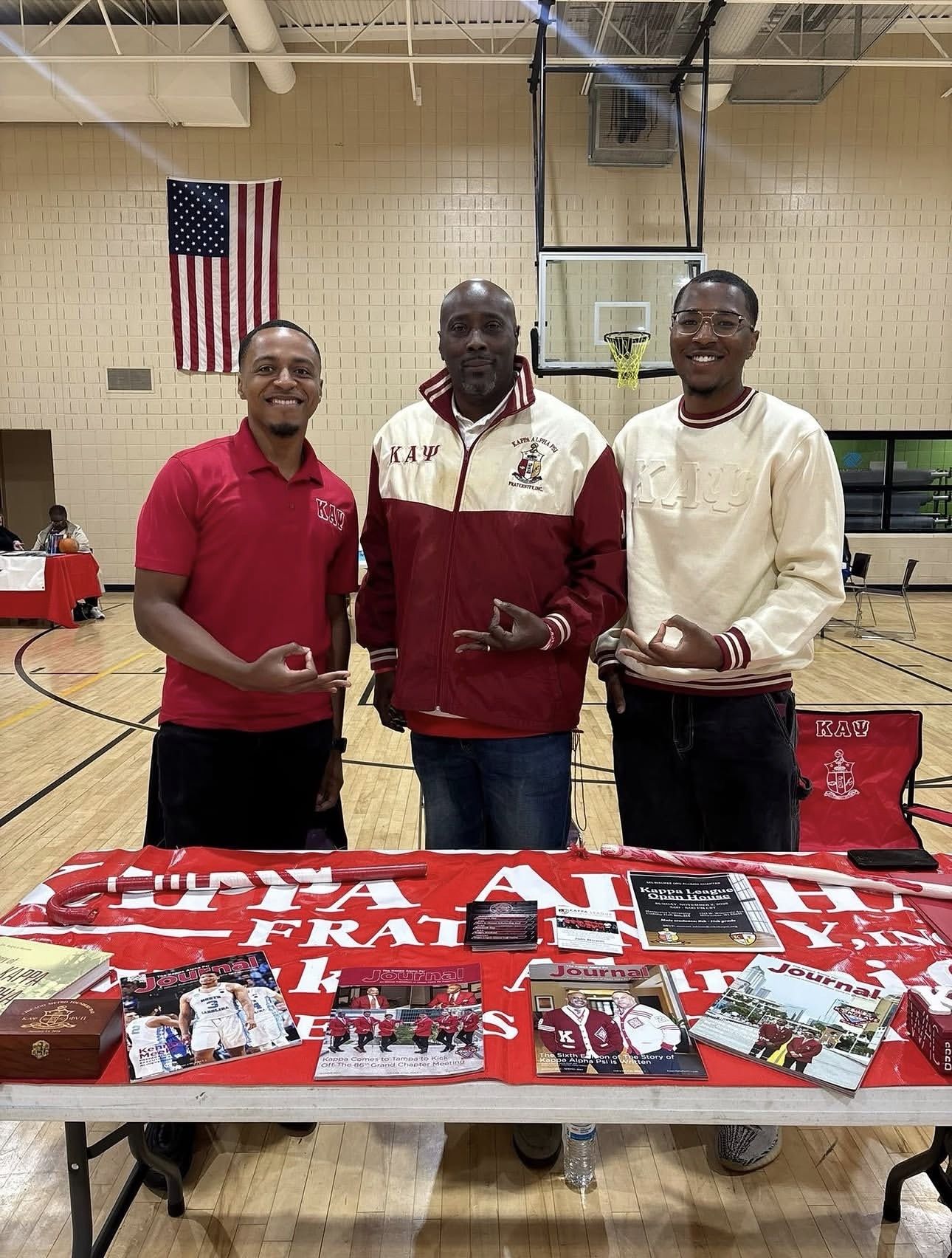 Brothers at the Kappa League open house table