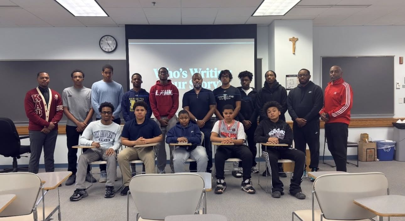 Kappa League young men and chapter brothers in a classroom session